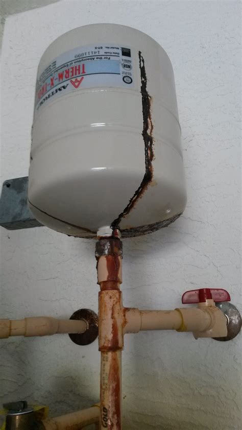 expansion tank leaking from bottom|Why Water Heater Leaking From Bottom & What To。